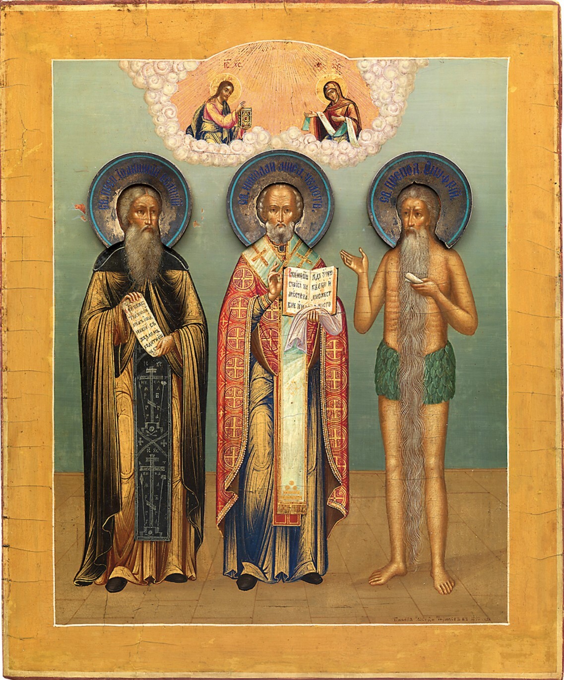 Saints Onuphrius the Great, Nicholas the Wonderworker, and Joannicius the Great. Wooden orthodox icon.