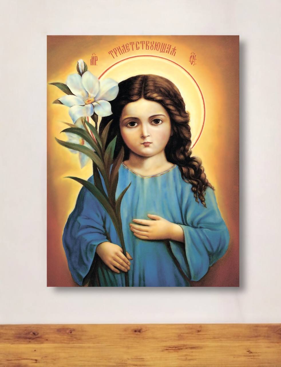 Orthodox wooden icon of the Theotokos as a child, painted in warm golden tones, perfect for prayer and devotion.