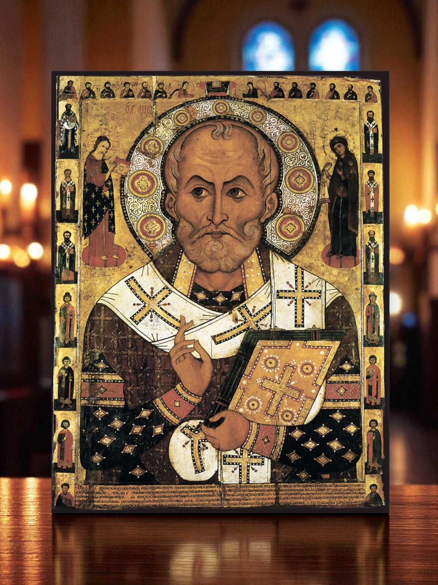 Saint Nicholas is depicted in strict Byzantine style, with expressive dignity and ornamental detail
Christ and the Theotokos appear beside him, offering a Gospel and omophorion, referencing his defense of Orthodoxy at the First Ecumenical Council