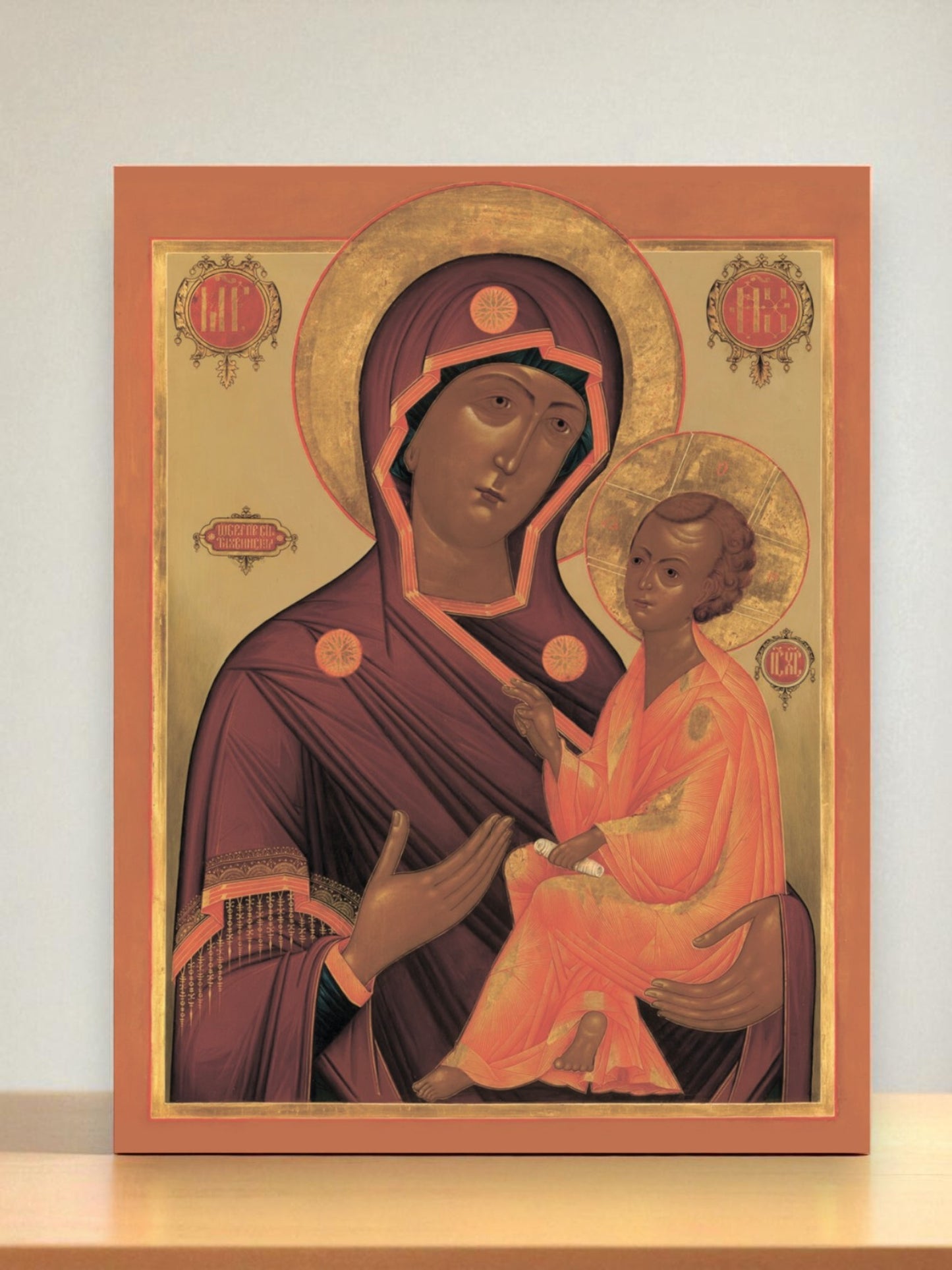 Christian icon of the Tikhvin Virgin Mary and Child, printed on wood with wax coating