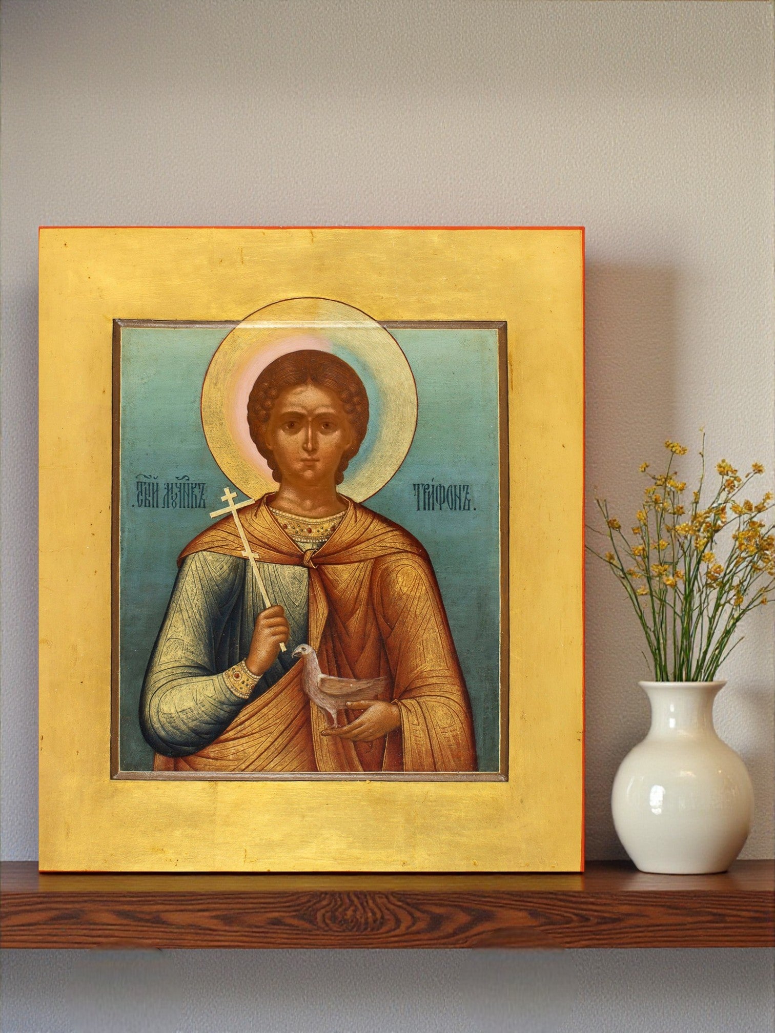 Saint Tryphon is traditionally shown holding a dove, which symbolizes:

Purity and innocence of his soul