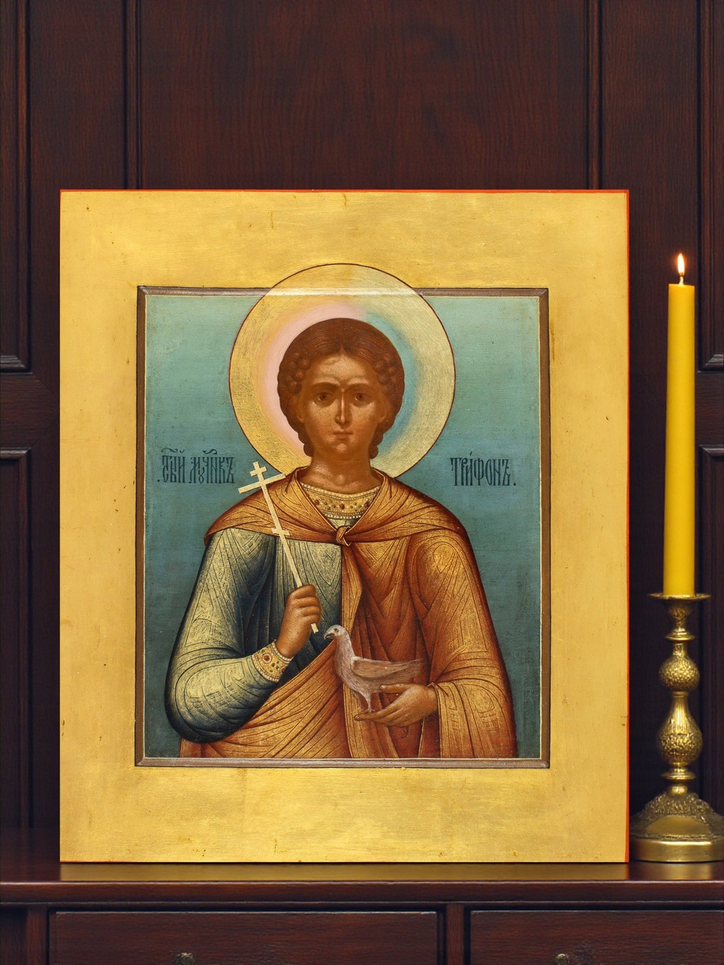 Orthodox icon of Saint Tryphon with a dove