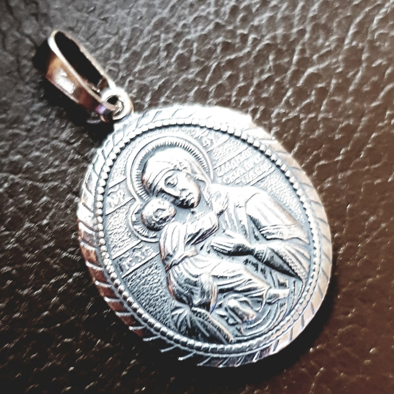 Necklace pendant with the Mother of God silver plated