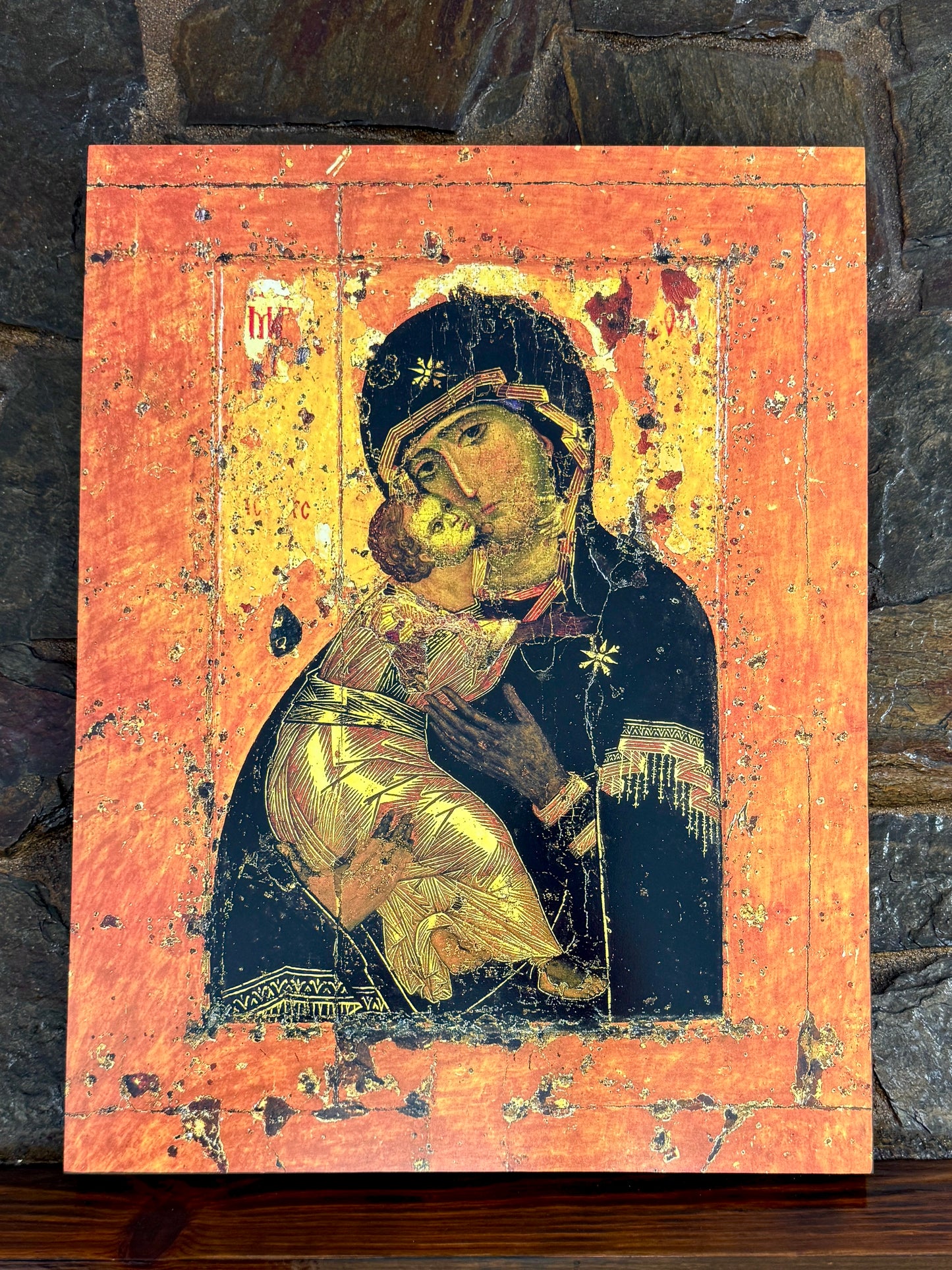 Sacred Orthodox artwork representing divine love between Mary and Jesus.