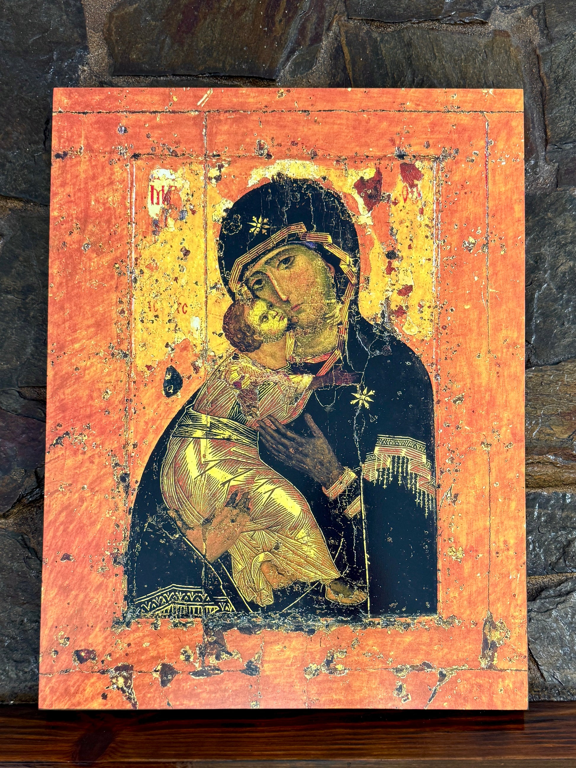 Sacred Orthodox artwork representing divine love between Mary and Jesus.