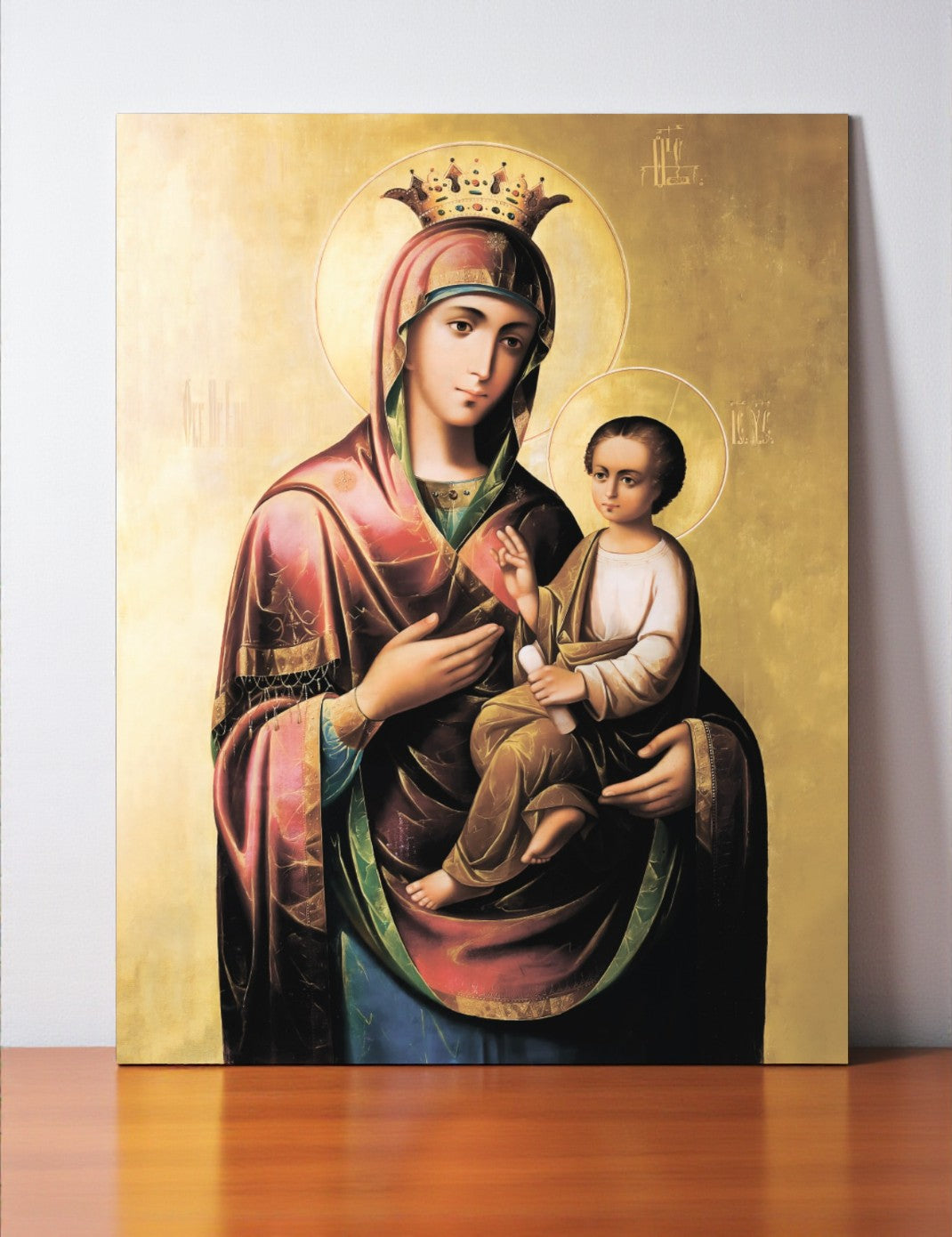 Close-up of Virgin Mary holding Jesus in the Quick to Hear icon