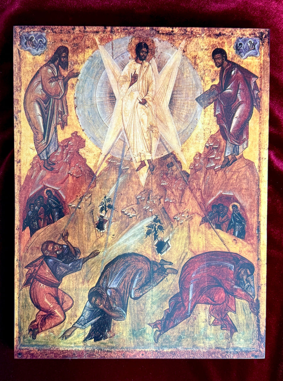 An antique Eastern Orthodox icon painting depicting the Transfiguration, featuring a central figure of Jesus Christ on a golden mountain with angels and figures in the surrounding rocks, set against a dark red velvet background.