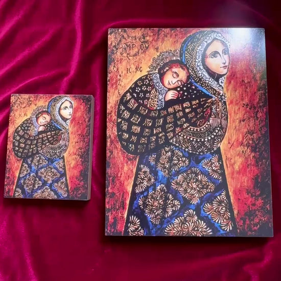 Mother of God icon with Baby Jesus wrapped in cloth against her shoulder