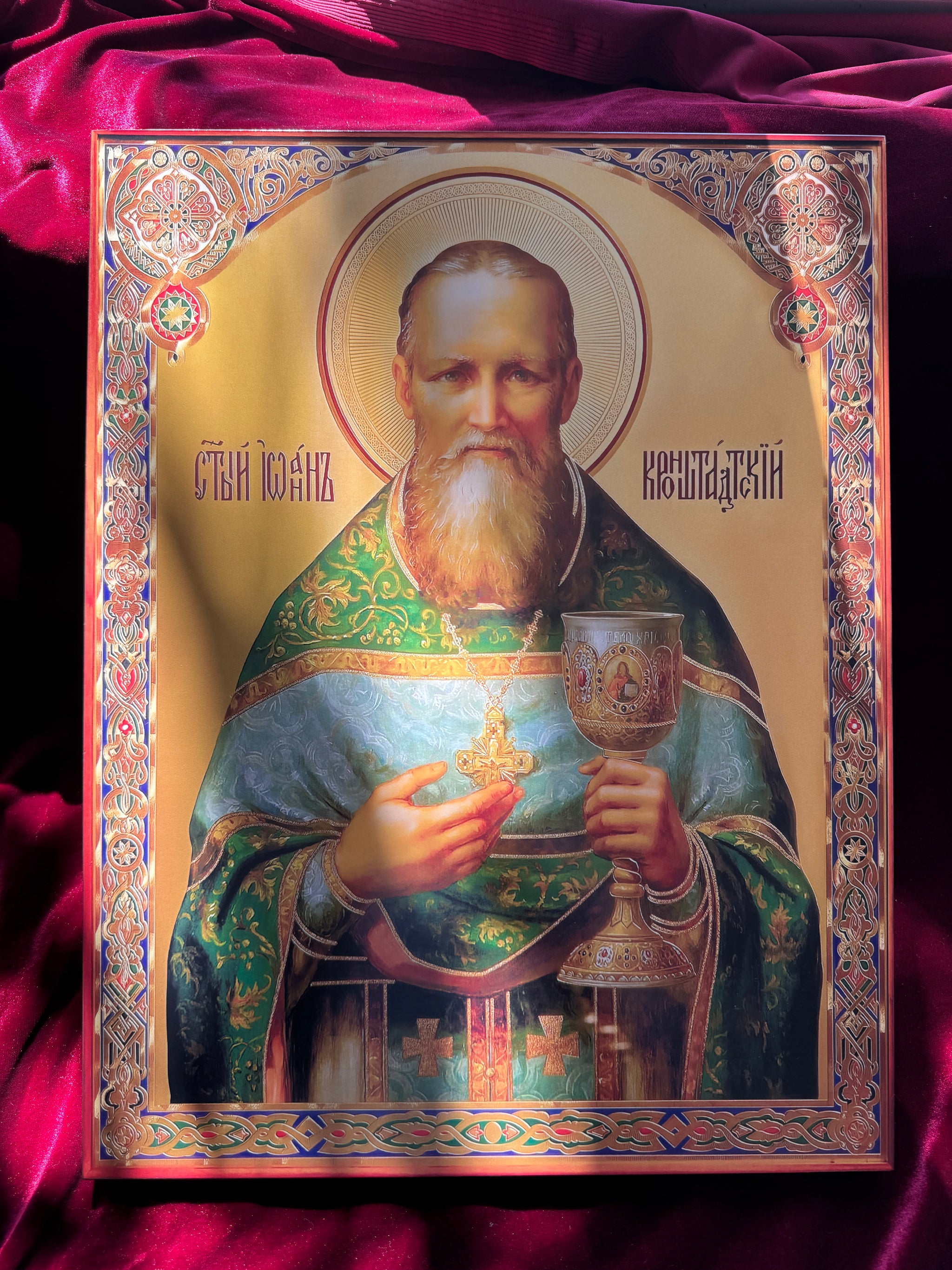 Orthodox icon of Saint John of Kronstadt with traditional vestments and blessing gesture