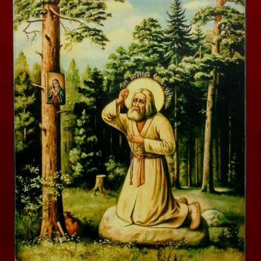 Saint Seraphim of Sarov praying. Wooden orthodox icon